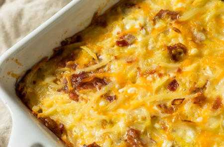 Titelbild für Rigatoni al forno mit Käse überbackene Rigatoni in Sauce mit Hackfleisch und Schinken