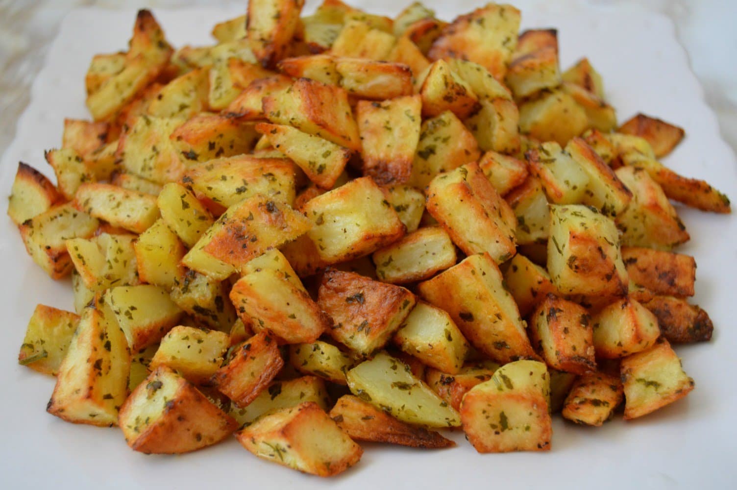 Titelbild für Parmesan-Knoblauch-Kartoffelecken oder leckerer Snack