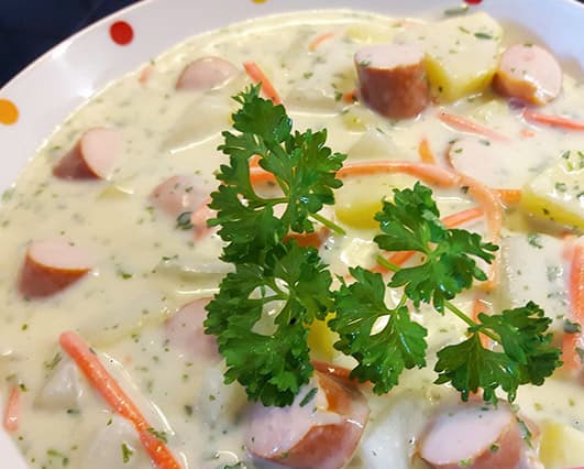 Titelbild für Kohlrabikartoffelmohrrübeneintopf mlt Wiener Würstchen